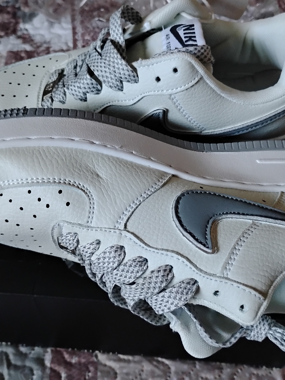 Nike White Leather Low-Top Sneakers with Gray Swoosh